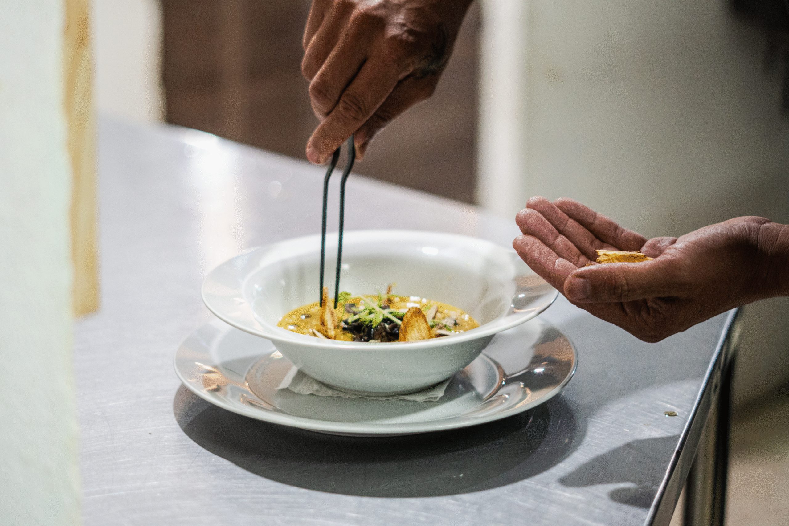 Chef decorating plate